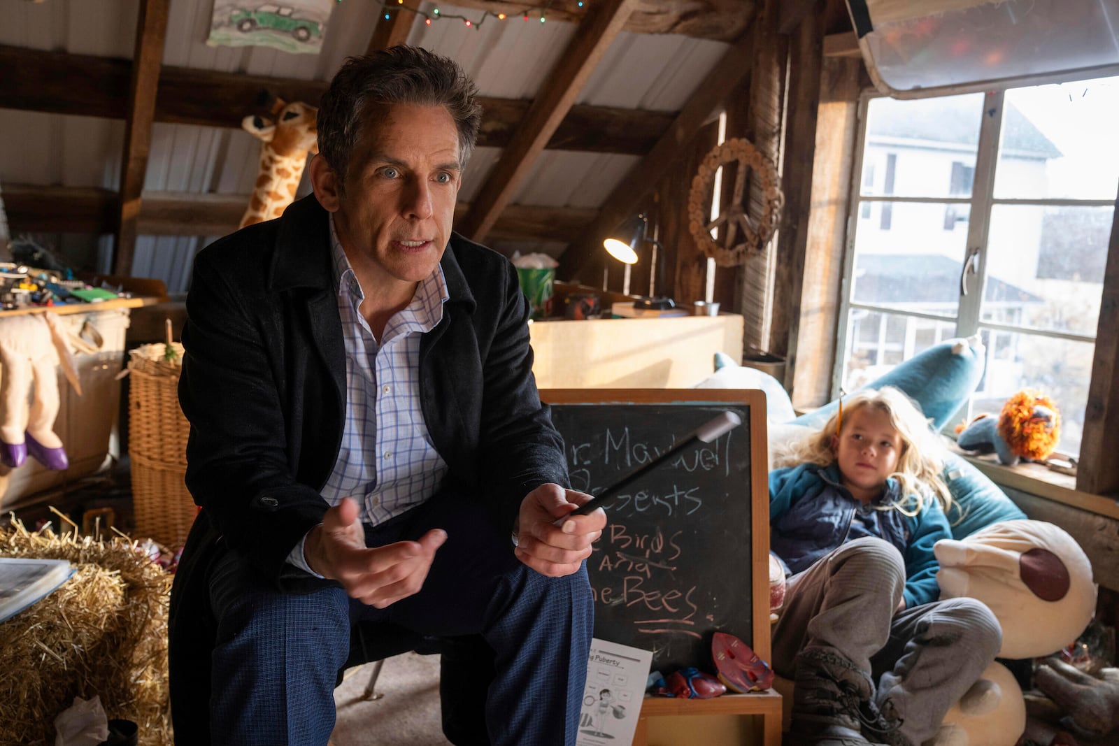 This image released by Disney shows Ben Stiller, left, and Arlo Janson in a scene from "Nutcrackers." (Ryan Green/Disney via AP)