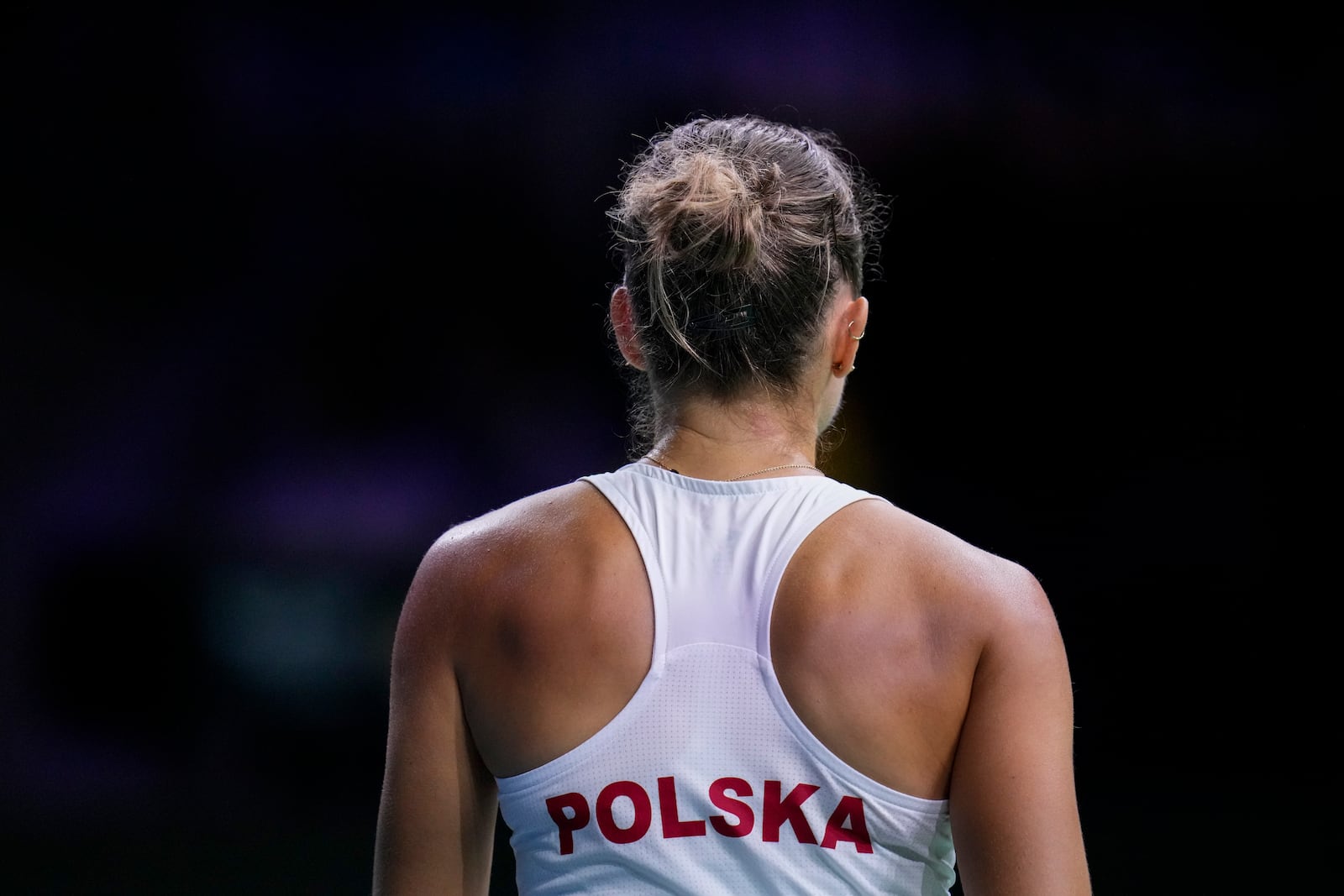 Poland's Magda Linette competes against Spain's Sara Sorriber Tormo during the Billie Jean King Cup Finals, at the Martin Carpena Sports Hall, in Malaga, southern Spain, on Friday, Nov. 15, 2024. (AP Photo/Manu Fernandez)