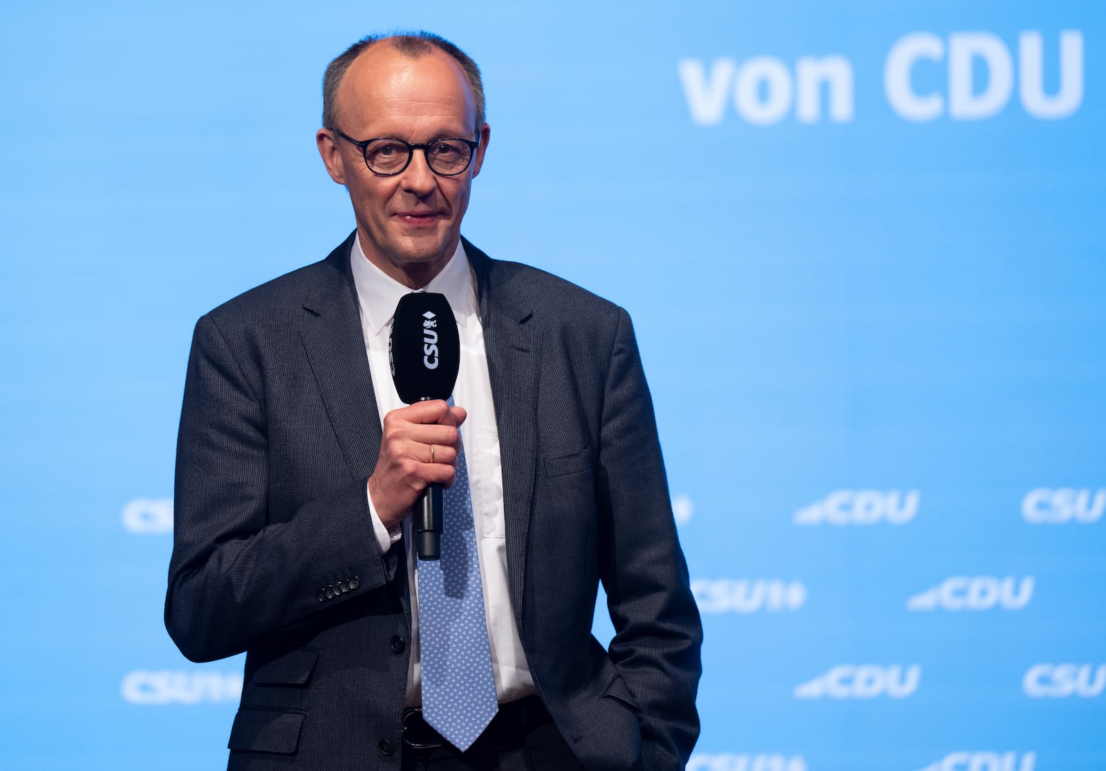 Friedrich Merz, CDU Federal Chairman and Union candidate for Chancellor, speaks at the joint CSU and CDU campaign closing for the Bundestag elections, in Munich, Germany, Saturday, Feb. 22, 2025. (Sven Hoppe/dpa via AP)