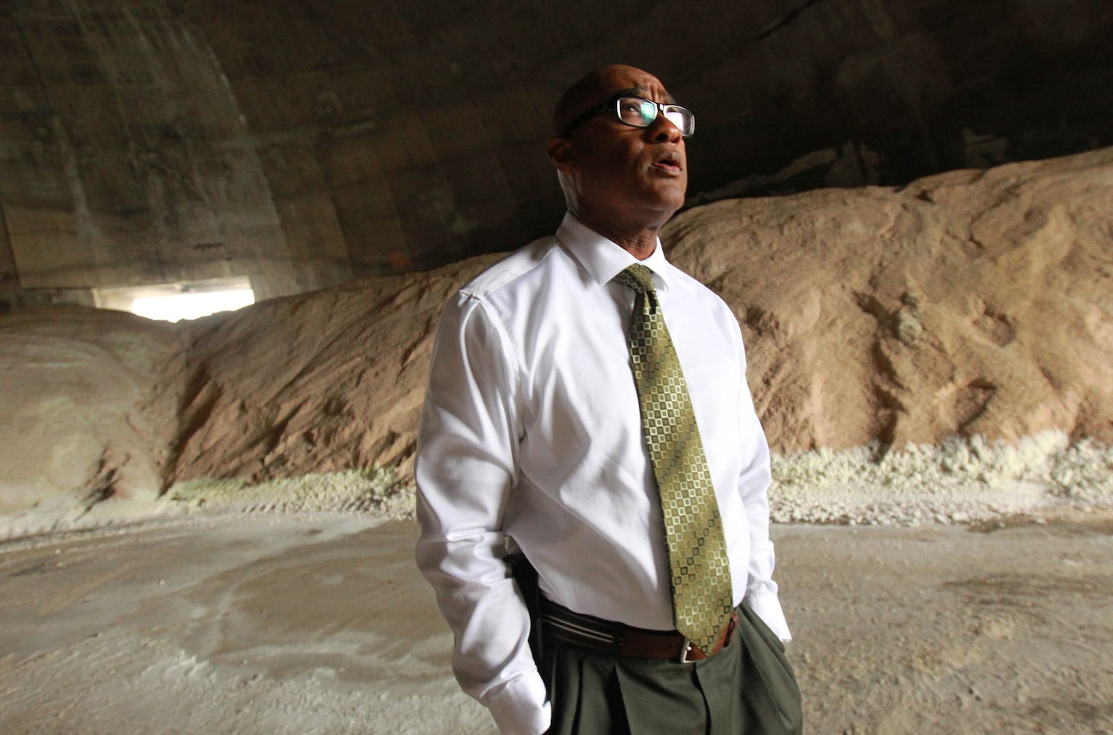 Fred Stovall, Director of Public Works at City of Dayton, looks over the salt in storage at the city’s facility. .JIM WITMER / STAFF