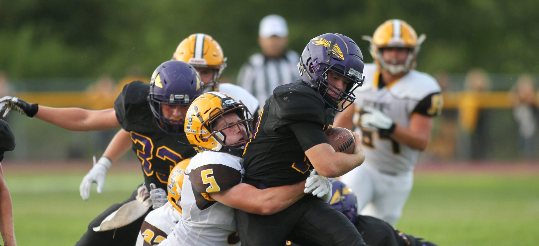 Photos: Mechanicsburg beats Kenton Ridge 27-3 in Week 1