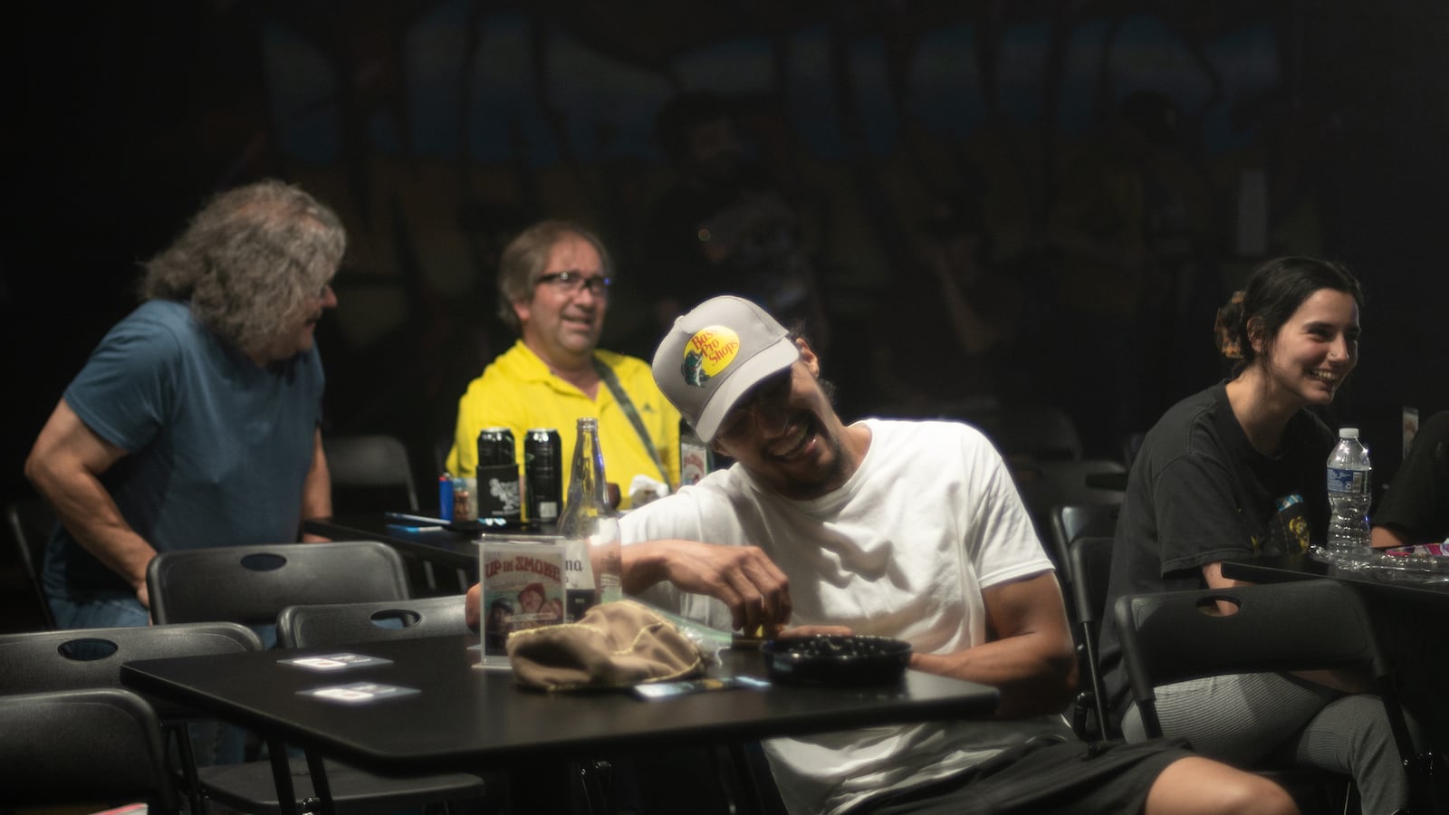 The audience enjoys a show at the Jokes & Tokes Comedy Club. Photo by Eric Boso