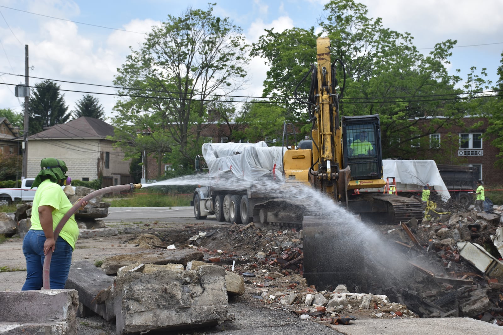 Crews with Bladecutter's Demolition remove debris from a site on the 400 block of Salem Ave. on Monday, June 3, 2024. A dead body was discovered during demolition activities. CORNELIUS FROLIK / STAFF