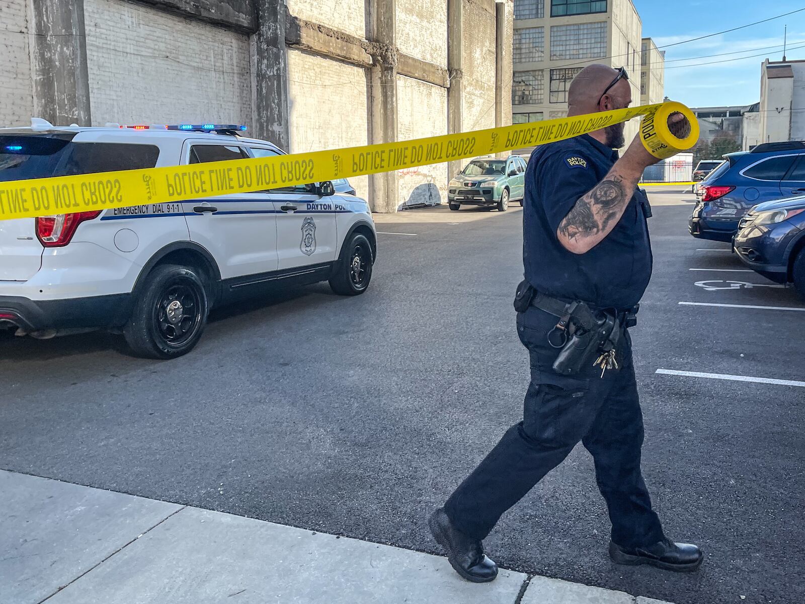 Police are investigating after a female was shot during a fight involving a group of young people Friday afternoon, Nov. 4, 2022, in the 100 block of East Third Street in Dayton's Fire Blocks district. JIM NOELKER/STAFF