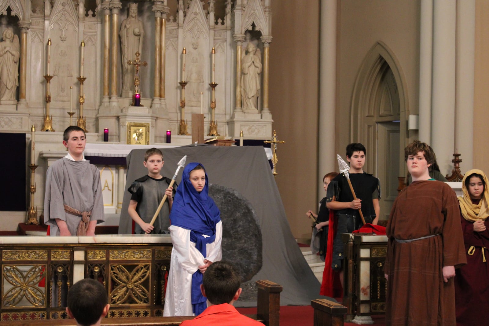 Youth at Emmanuel Catholic Church in Dayton participate in a Living Stations of the Cross. CONTRIBUTED