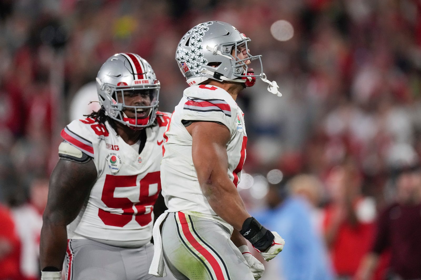 Ohio State linebacker Cody Simon (0) celebrates sacking Oregon quarterback Dillon Gabriel during the second half in the quarterfinals of the Rose Bowl College Football Playoff, Wednesday, Jan. 1, 2025, in Pasadena, Calif. (AP Photo/Mark J. Terrill)