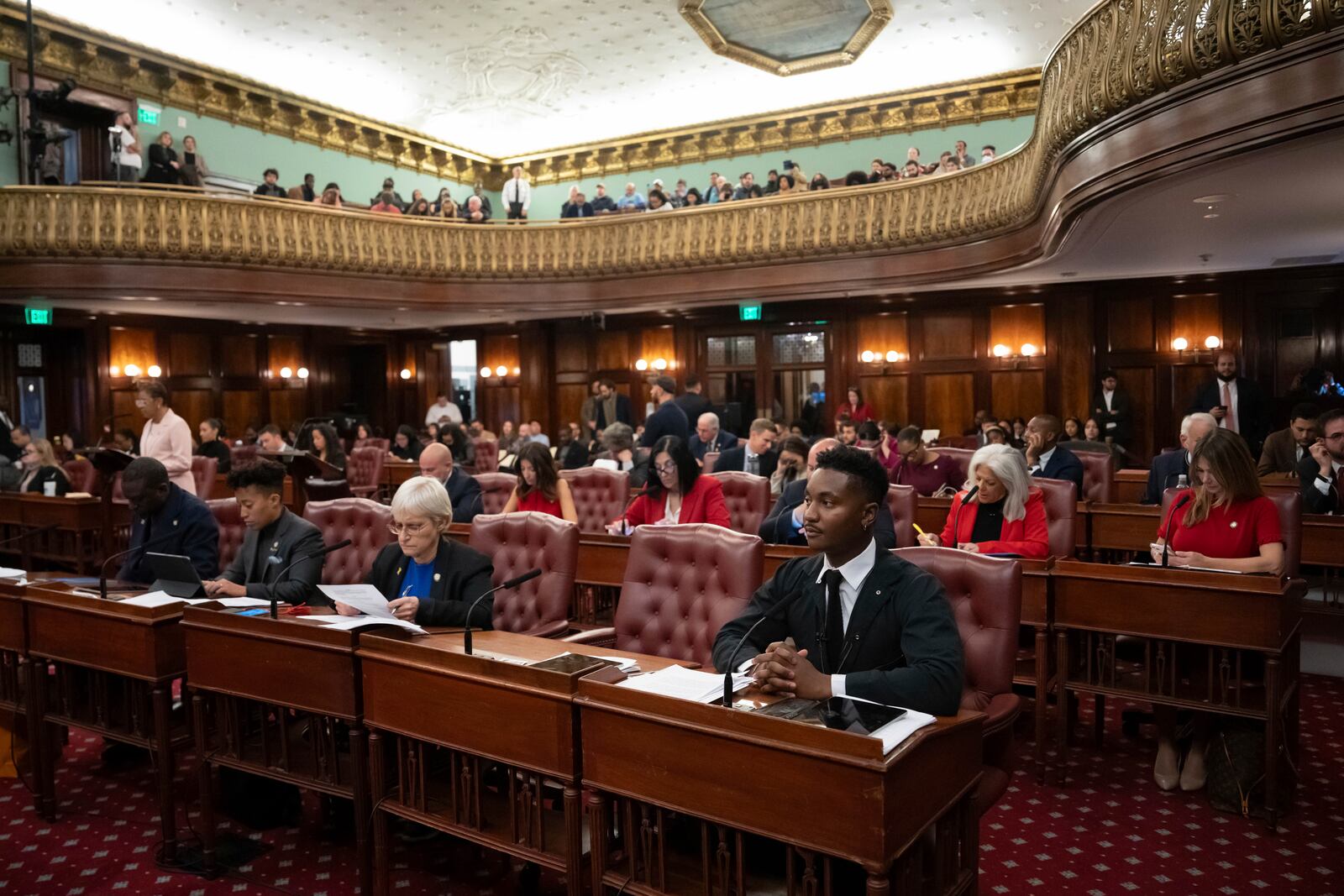 Councilmember Chi Ossé, D-Brooklyn, foreground, attends a City Council meeting, Wednesday, Nov. 13, 2024, in New York. (AP Photo/Adam Gray)