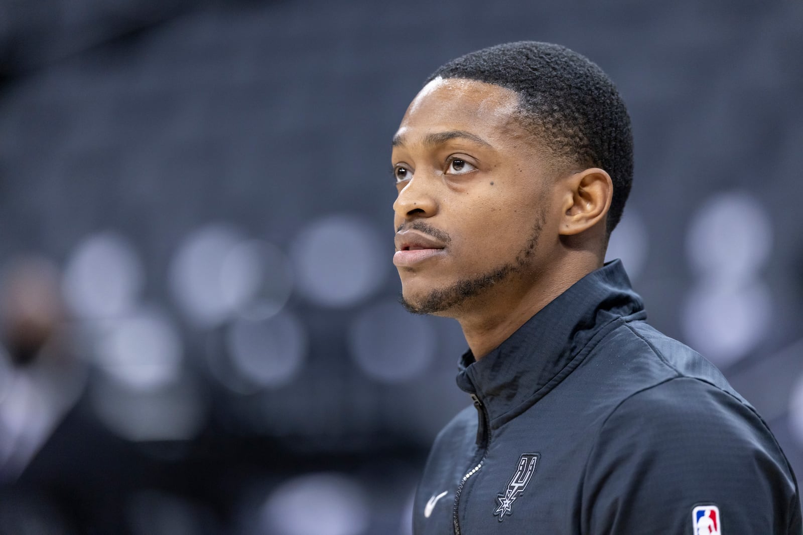 San Antonio Spurs guard De'Aaron Fox warms up before an NBA basketball game against the Sacramento Kings, Friday, March 7, 2025, in Sacramento, Calif. (AP Photo/Sara Nevis)