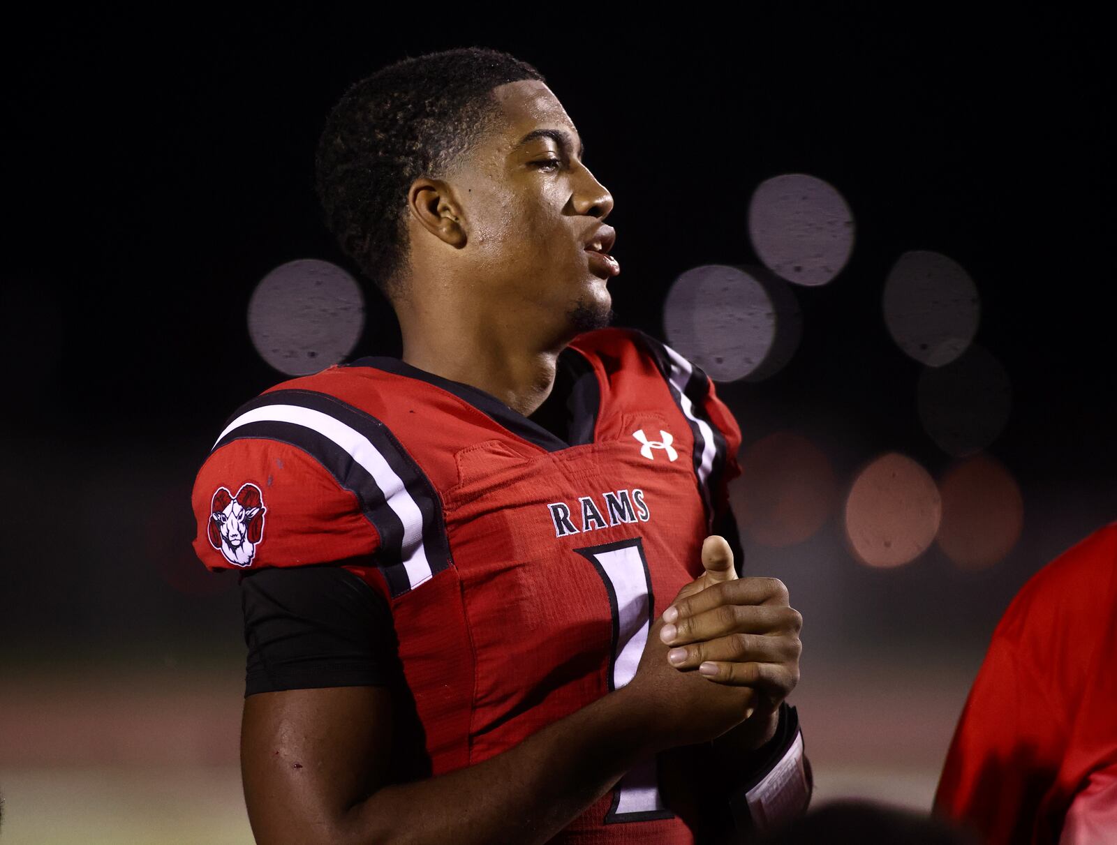 Trotwood-Madison quarterback Timothy Carpenter talks to the team after a victory against Springfield on Friday, Sept. 1, 2023, in Trotwood. David Jablonski/Staff