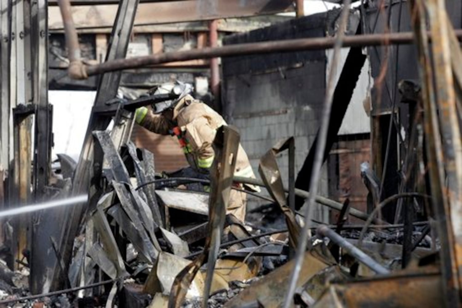 Page Manor shopping center damaged by fire