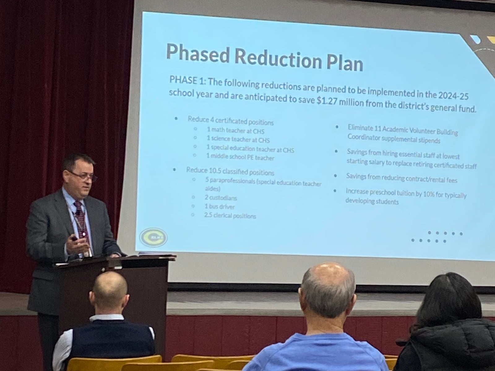 Centerville superintendent Jon Wesney speaks at a community forum Wednesday at Magsig Middle School while Centerville treasurer Laura Sauber looks on. Eileen McClory/ Staff