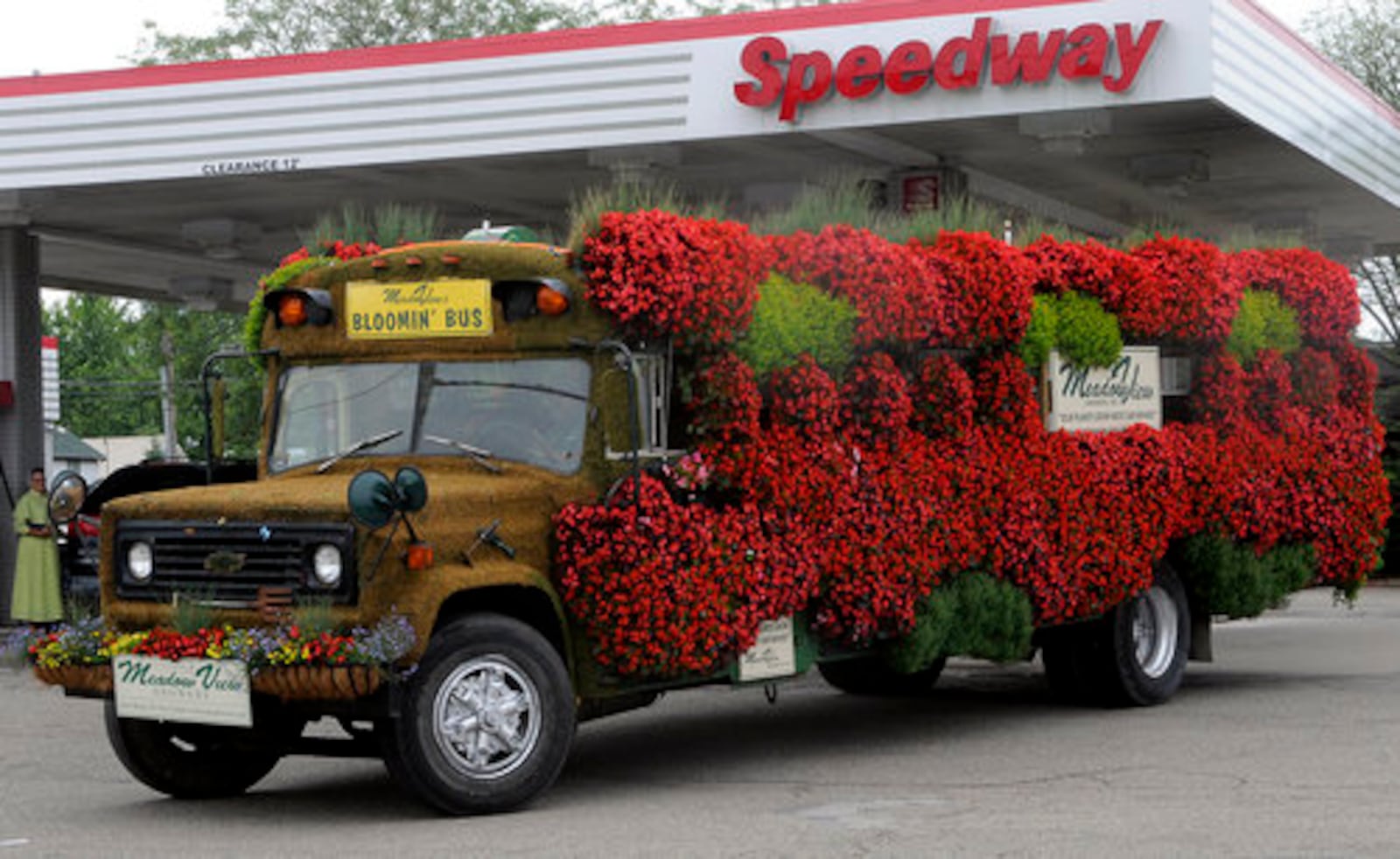 The Bloomin' Bus at Meadow View Growers in New Carlisle was covered with begonias and moss. MARSHALL GORBY / STAFF