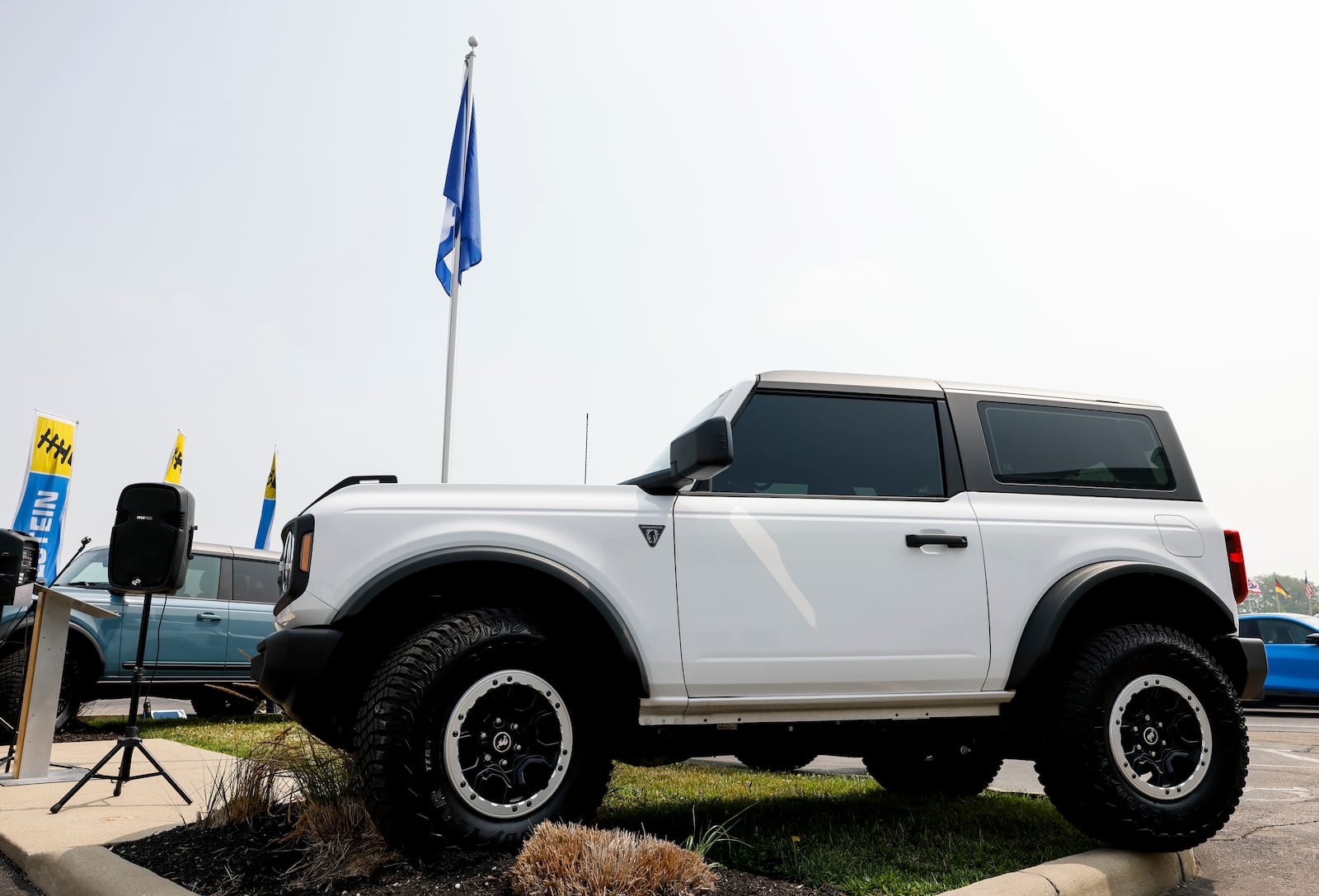 Employees and leaders gathered at Hamilton’s thyssenkrupp BILSTEIN Wednesday, June 28, 2023 for a flag ceremony to celebrate receiving Ford Q1 Certification.
Each year, Ford Motor Company awards roughly 100 of its more than 1,400 Tier 1 production suppliers with Q1 certification. This year, Hamilton’s thyssenkrupp BILSTEIN was among the recipients. Three BILSTEIN equipped Ford Broncos were the backdrop for the ceremony. NICK GRAHAM/STAFF