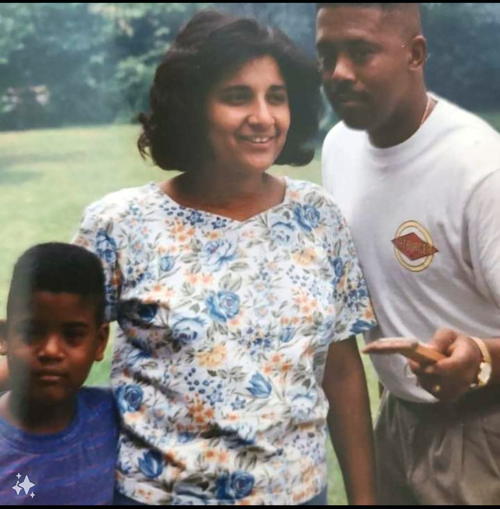 Cosby (left) as a boy in Atlanta with his parents Reva (center) and James Cosby.