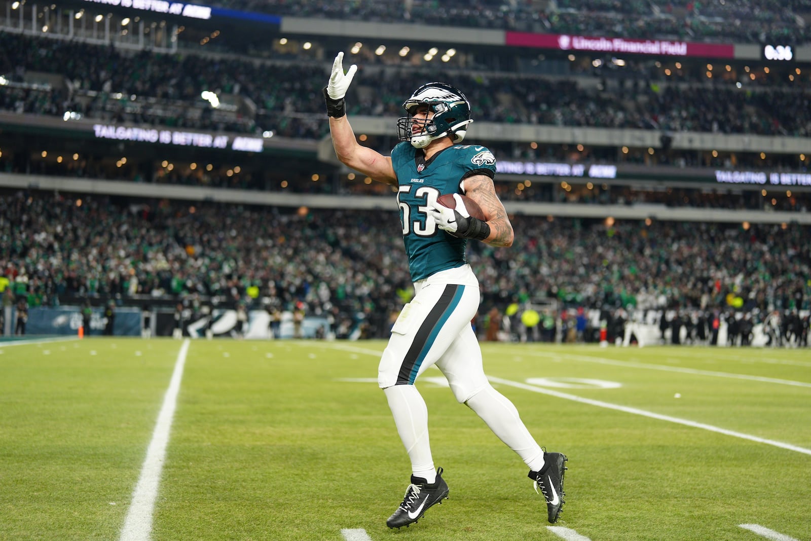 Philadelphia Eagles linebacker Zack Baun celebrates making an interception during the first half of an NFL wild-card playoff football game against the Green Bay Packers on Sunday, Jan. 12, 2025, in Philadelphia. (AP Photo/Derik Hamilton)