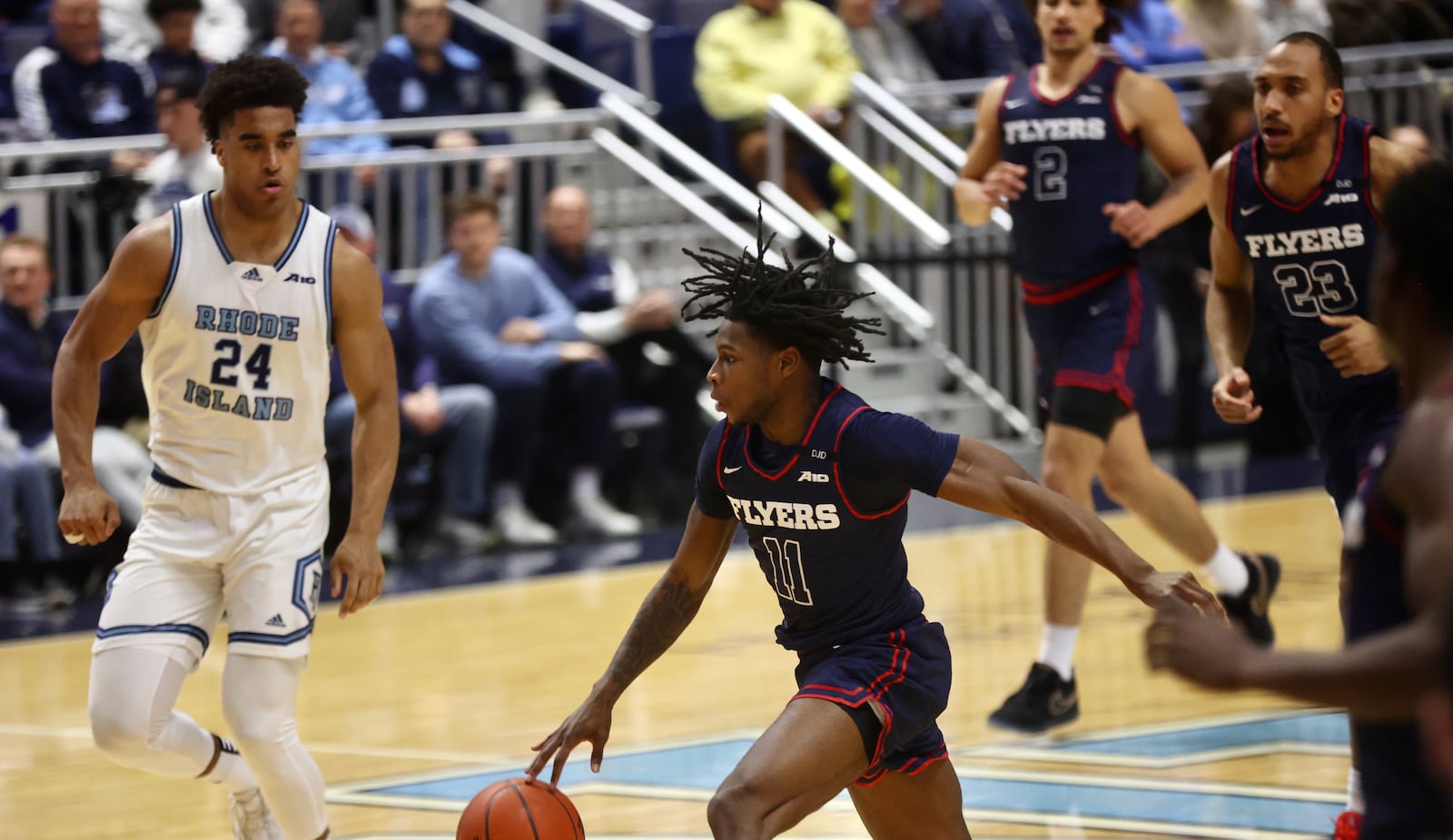 Dayton's Malachi Smith dribbles against Rhode Island on Wednesday, Feb. 26, 2025, at the Ryan Center in Kingston, R.I. David Jablonski/Staff