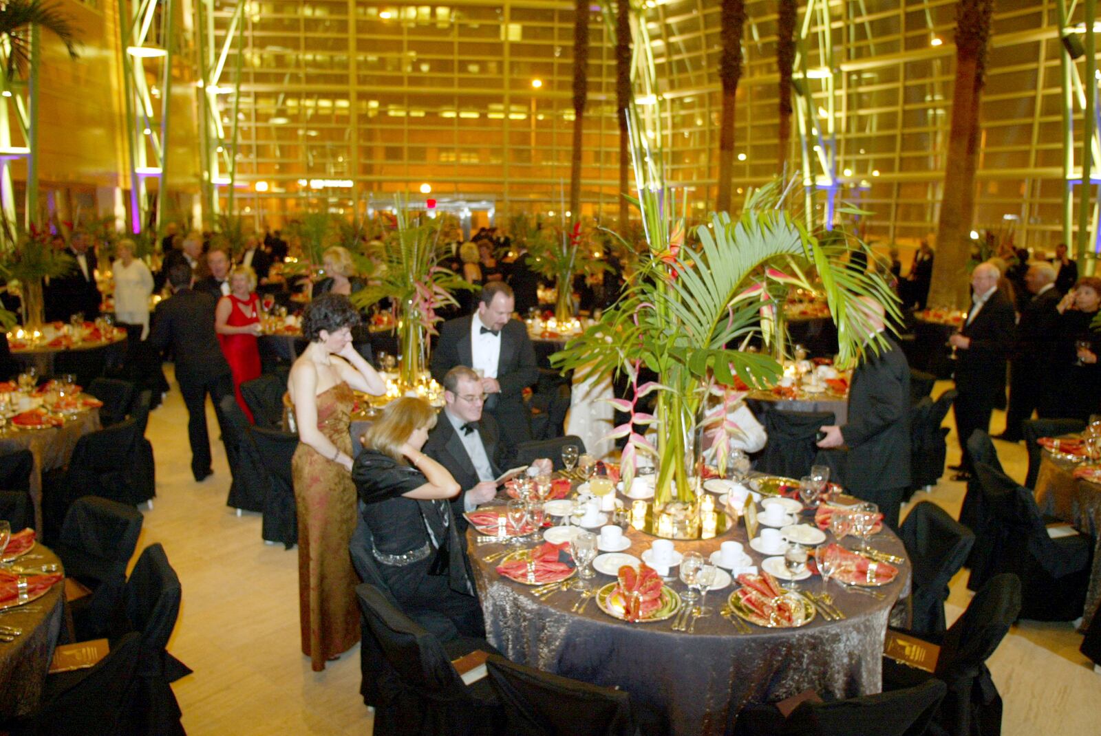 Guests sit down to dinner in the wintergarden during the opening gala of the Schuster Center in 2003.