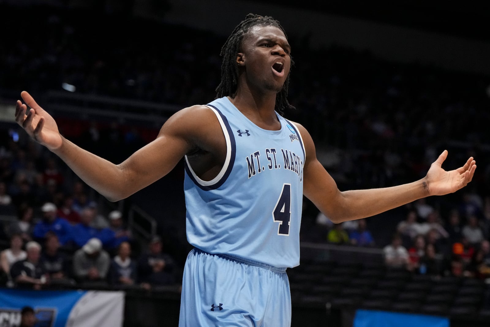 Mount St. Mary's forward Dola Adebayo reacts during the first half of a First Four college basketball game against American University in the NCAA Tournament, Tuesday, March 19, 2025, in Dayton, Ohio. (AP Photo/Jeff Dean)