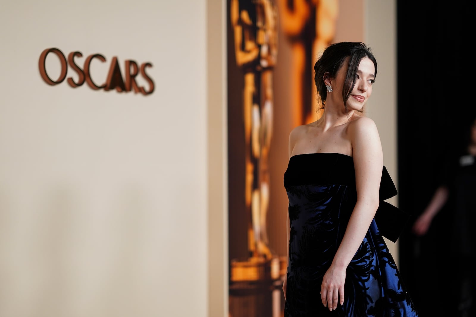 Mikey Madison arrives at the Oscars Nominees Dinner on Tuesday, Feb. 25, 2025, at the Academy Museum of Motion Pictures in Los Angeles. (Photo by Jordan Strauss/Invision/AP)