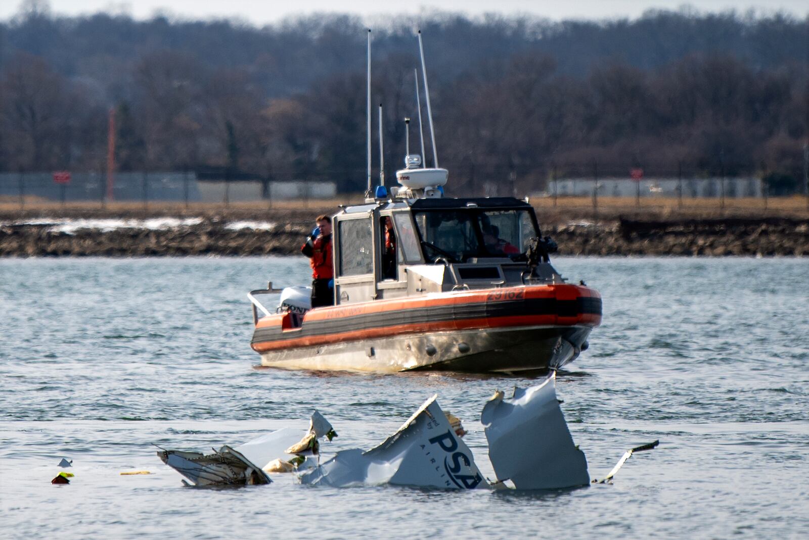 In this image provided by the U.S. Coast Guard, wreckage is seen in the Potomac River near Ronald Reagan Washington National Airport, Thursday, Jan. 30, 2025 in Washington. (Petty Officer 2nd Class Taylor Bacon, U.S. Coast Guard via AP)