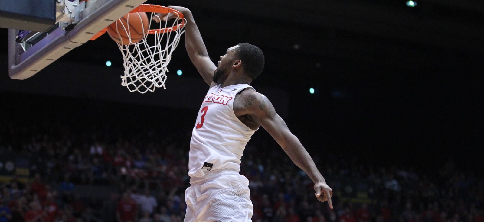 Dayton’s Trey Landers dunks an alley-oop pass from Jalen Crutcher against Saint Louis on Tuesday, Feb. 20, 2018, at UD Arena.