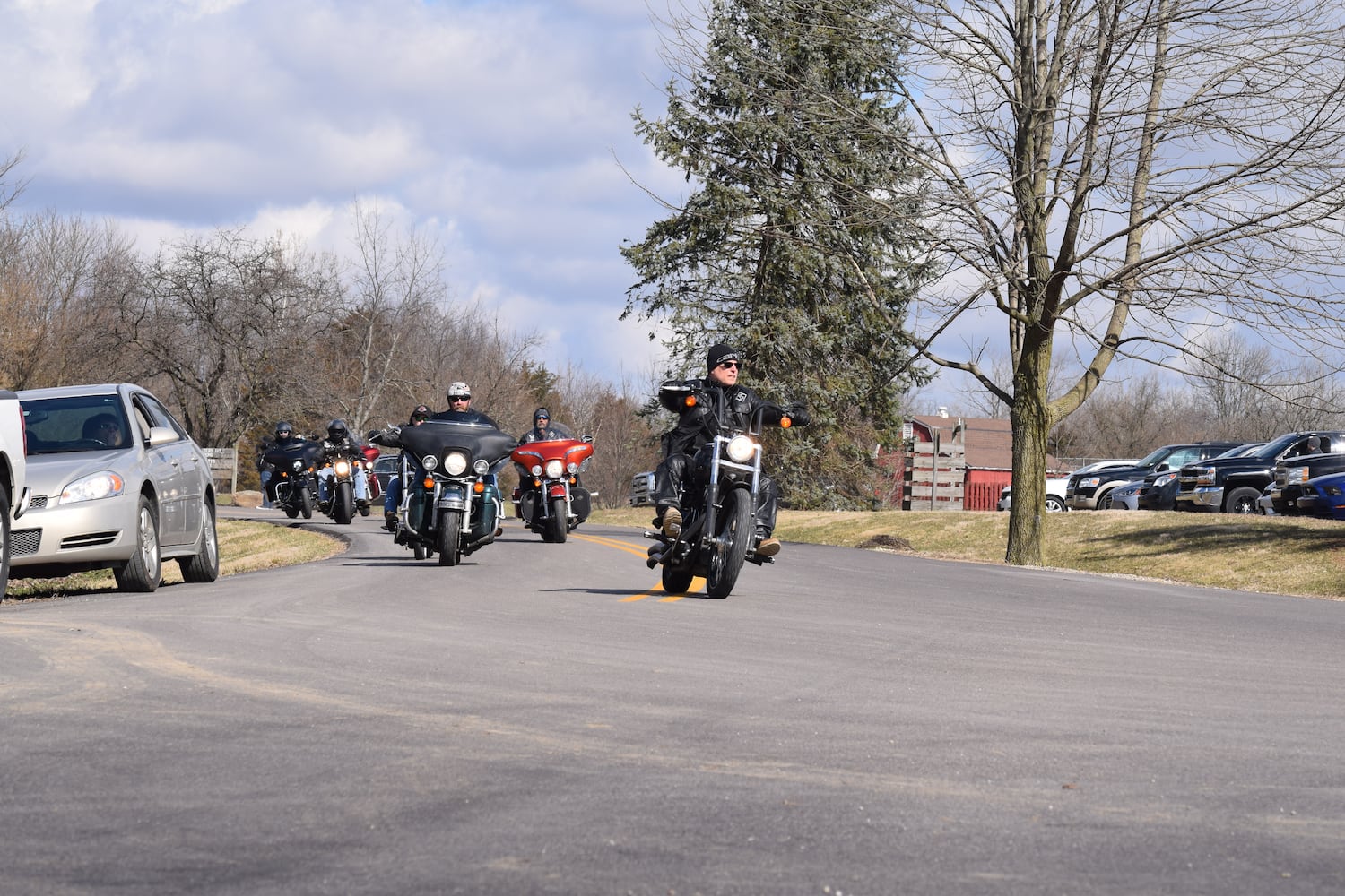 PHOTOS: Thousands of Outlaws attend motorcycle gang leaders funeral at Montgomery County Fairgrounds.