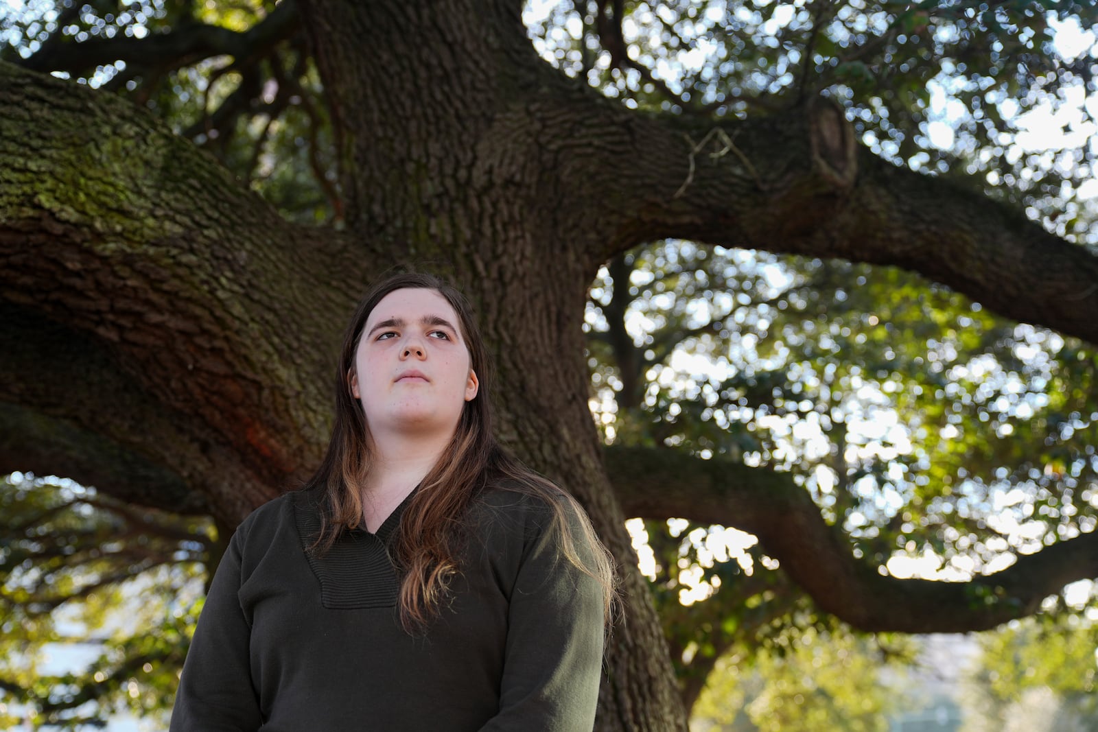 Mellow, a transgender woman, poses for a portrait, Monday, Feb. 3, 2025, in Norfolk, Va. (AP Photo/Stephanie Scarbrough)