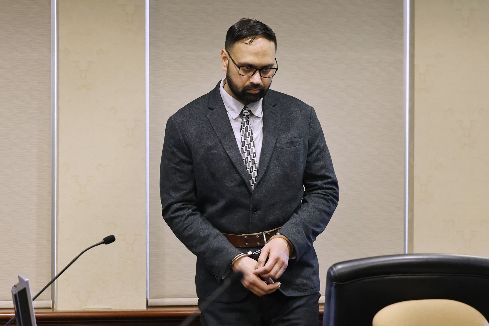 Quadruple homicide suspect Gurpreet Singh appeared in Judge Gregory Howard's courtroom for the first time with his new attorneys Mark Wieczorek and Alex Deardorff Tuesday, June 6, 2023 in Hamilton. NICK GRAHAM/STAFF