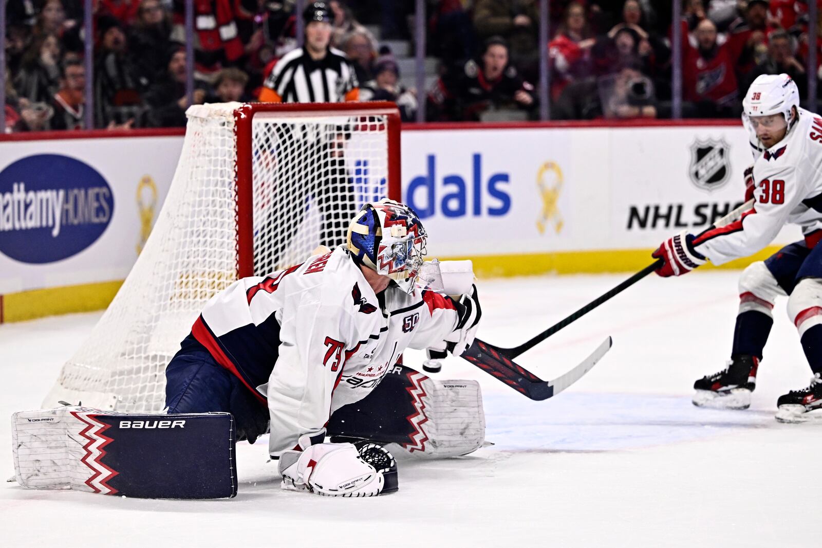 Washington Capitals goaltender Charlie Lindgren (79) is scored on by Ottawa Senators' Shane Pinto (not shown) during second period NHL hockey action in Ottawa, on Thursday, Jan. 30, 2025. (Justin Tang/The Canadian Press via AP)