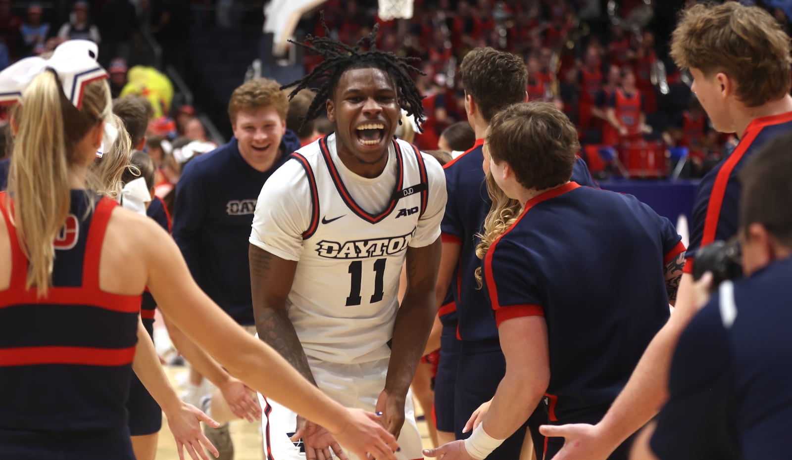 Dayton's Malachi Smith leaves the court after a victory against Loyola Chicago on Saturday, Jan. 18, 2025, at UD Arena. David Jablonski/Staff