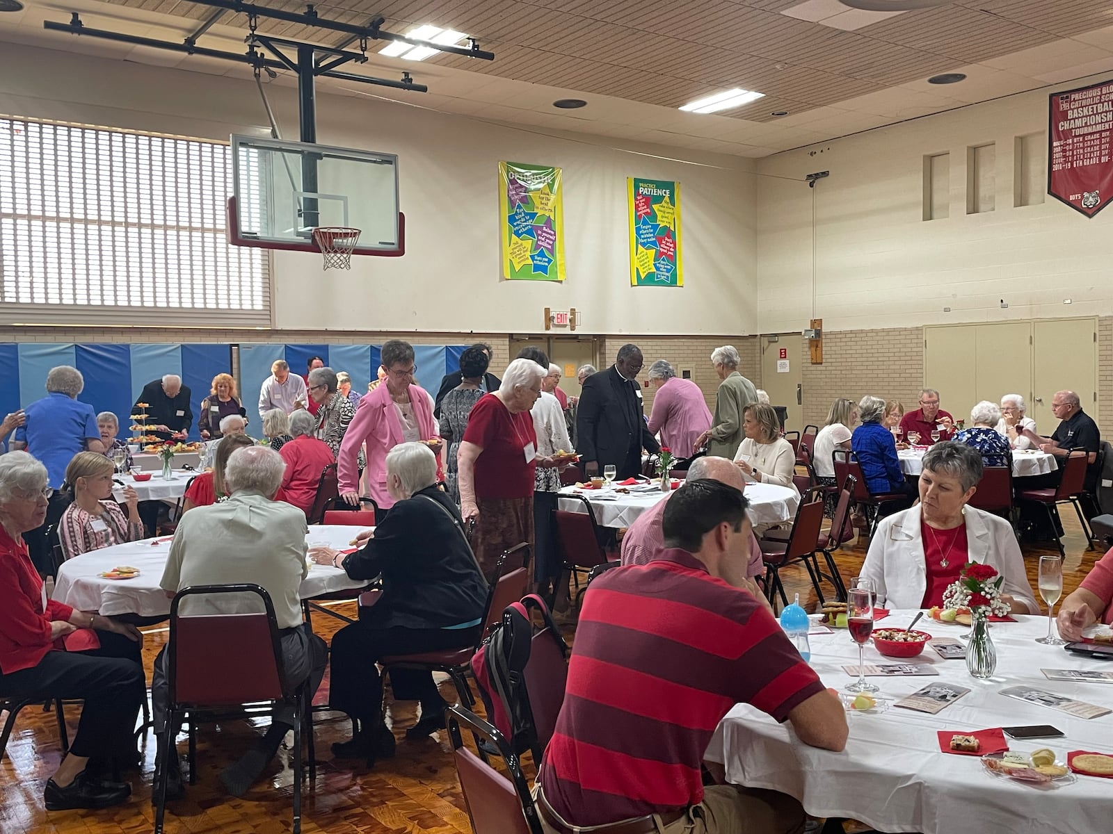 The Sisters of the Precious Blood help a 100th anniversary mass and celebration on Sunday, nodding to 100 years in the Dayton area.