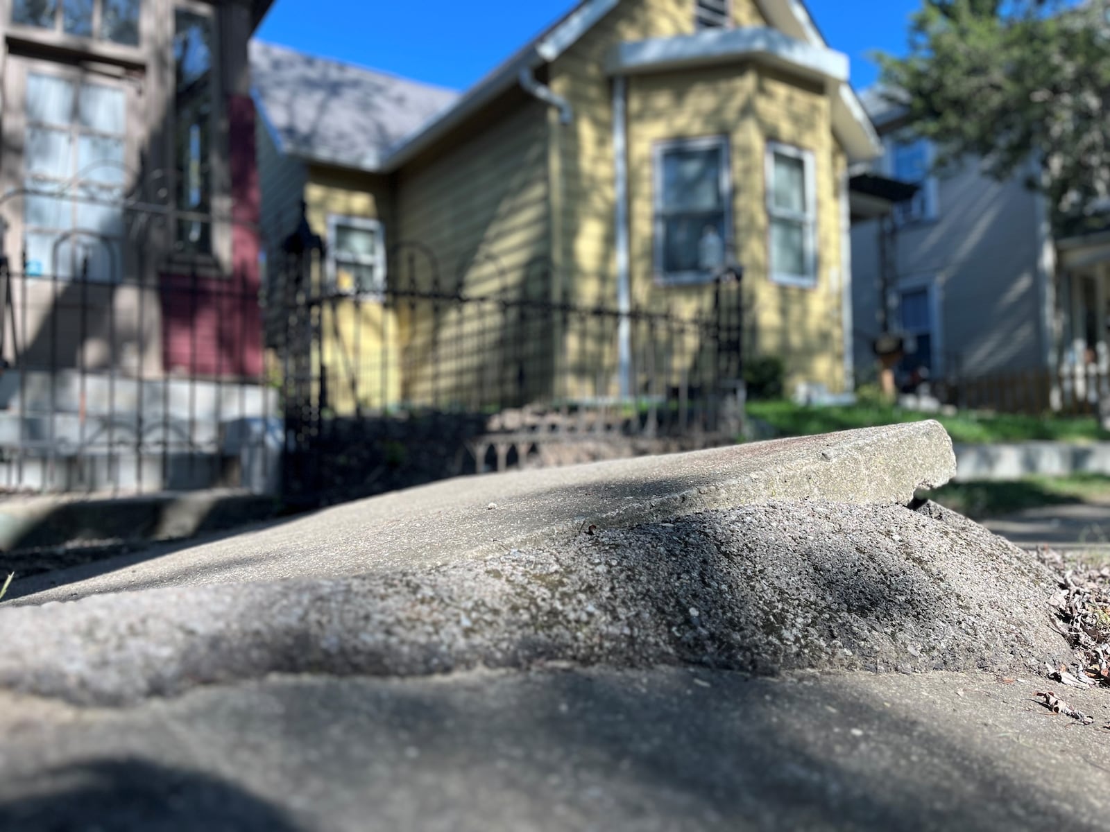 An uneven sidewalk in the city of Dayton. CORNELIUS FROLIK / STAFF