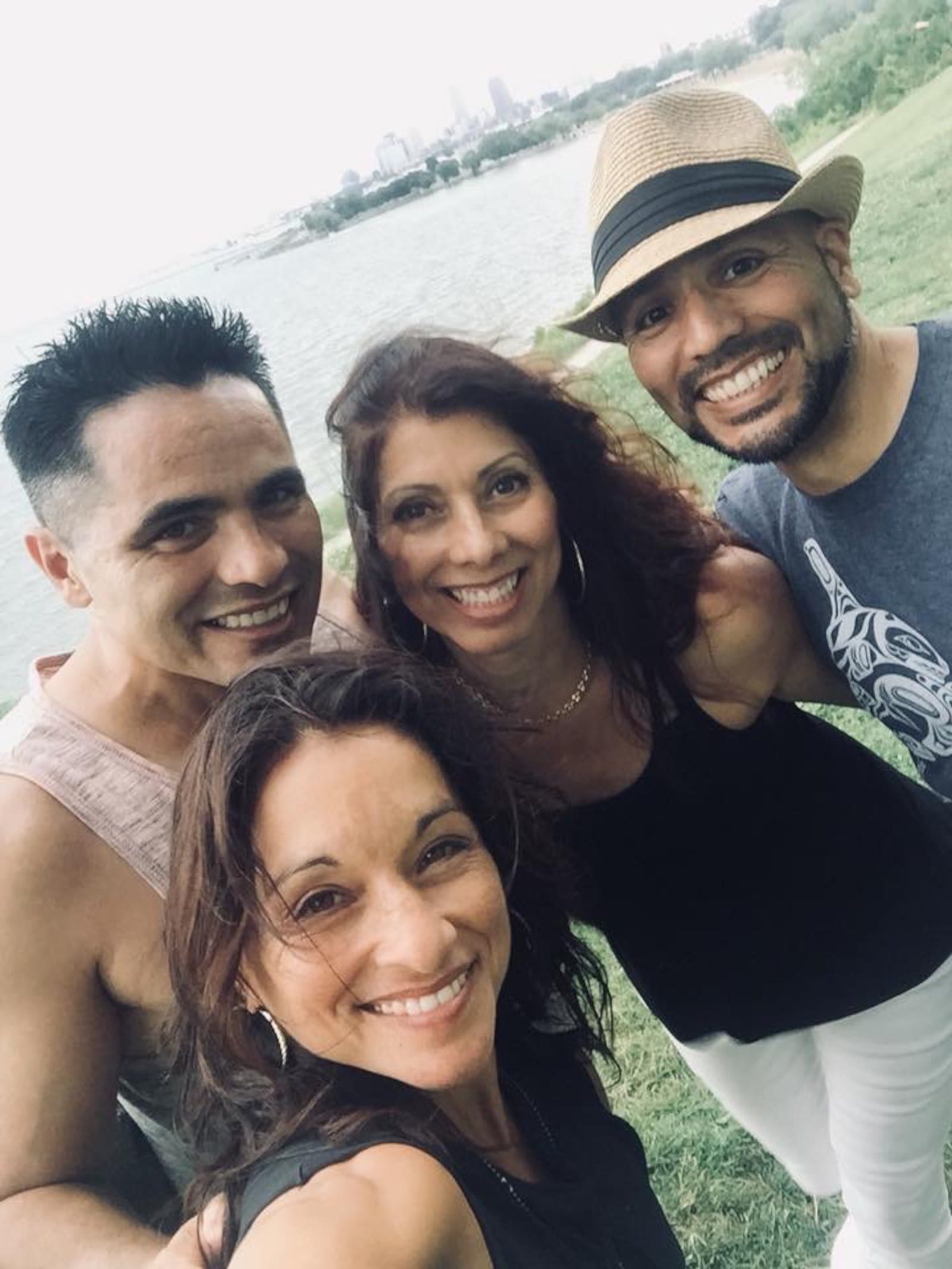 Adopted at birth, Lucianna (second from right) Seed recently met family members she never knew she had included Centerville's Raquel Rivera-Hill (front left).  The sister met up with their brothers Marcos and Daniel Rivera in the Cleveland area where Marcos resides.