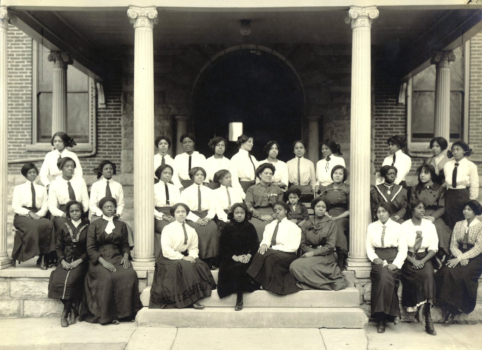 Hallie Quinn Brown sits surrounded by students at Wilberforce College, the early foundation of Central State University. REPRINTED BY PERMISSION OF CENTRAL STATE UNIVERSITY ARCHIVES, WILBERFORCE, OH