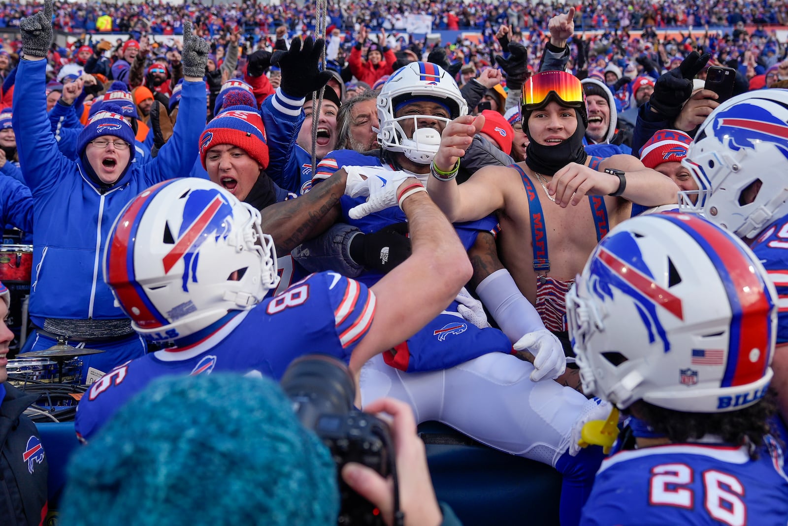 Buffalo Bills wide receiver Curtis Samuel (1) celebrates with fans after scoring a touchdown against the Denver Broncos during the fourth quarter of an NFL wild card playoff football game, Sunday, Jan. 12, 2025, in Orchard Park, N.Y. (AP Photo/Seth Wenig)