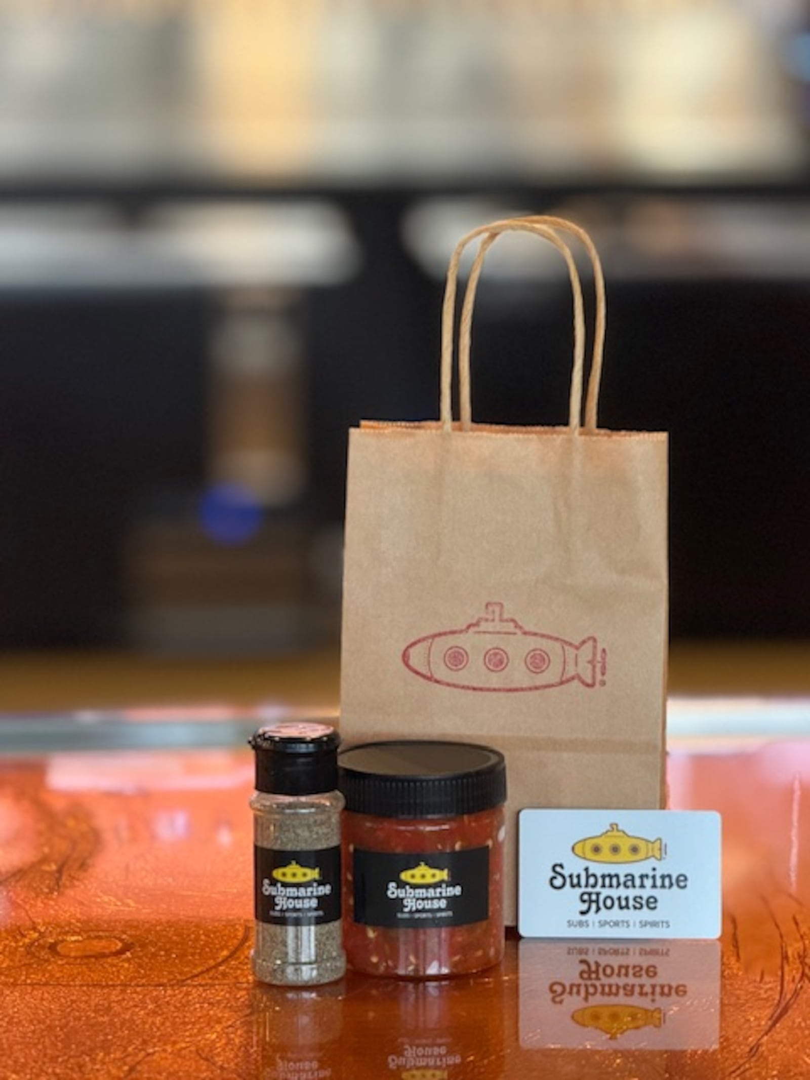 Customers who purchase a $50 gift card from the Submarine House through Dec. 31 will receive a gift bag filled with an 8 oz. jar of the restaurant’s famous hot pepper relish, a shaker of its signature steak spice and a $5 gift card for a future visit (CONTRIBUTED PHOTO).