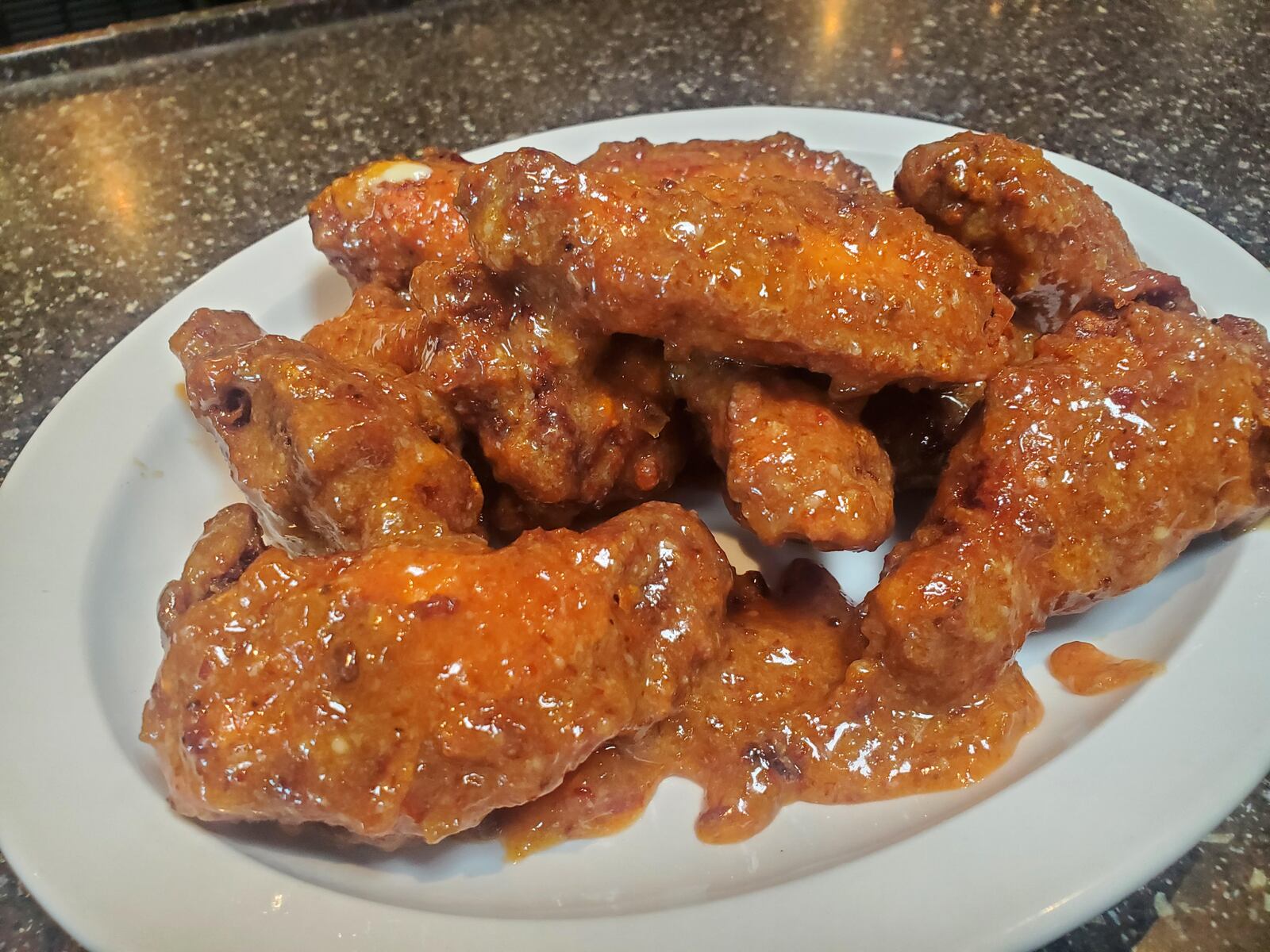 Archers Tavern will serve up these sweet chile Brie and bacon jam wings during Bacon Week Aug. 15-22, 2020. CONTRIBUTED