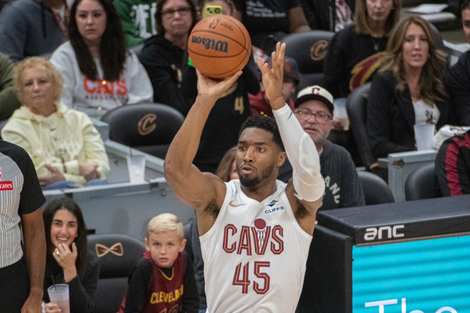 Cleveland Cavaliers' Donovan Mitchell (45) shoots against the Brooklyn Nets during the first half of an NBA basketball game in Cleveland, Saturday, Nov. 9, 2024. (AP Photo/Phil Long)