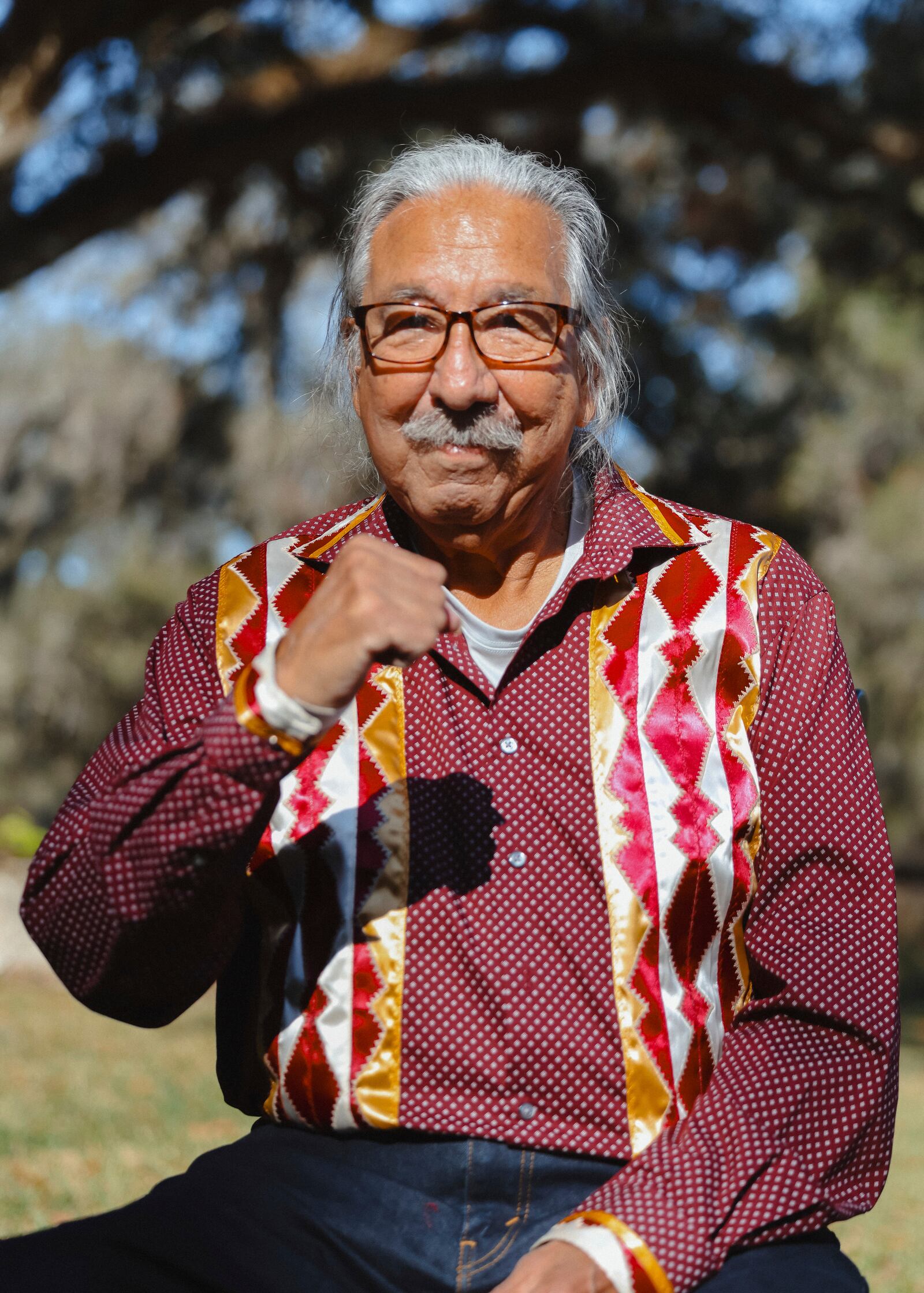 In this photo released by NDN Collective, Native American activist Leonard Peltier poses for pictures as he was released from a Florida prison on Tuesday, Feb. 18, 2025, weeks after then-President Joe Biden angered law enforcement officials by commuting his life sentence to home confinement in the 1975 killings of two FBI agents. (Angel White Eyes, NDN Collective via AP)