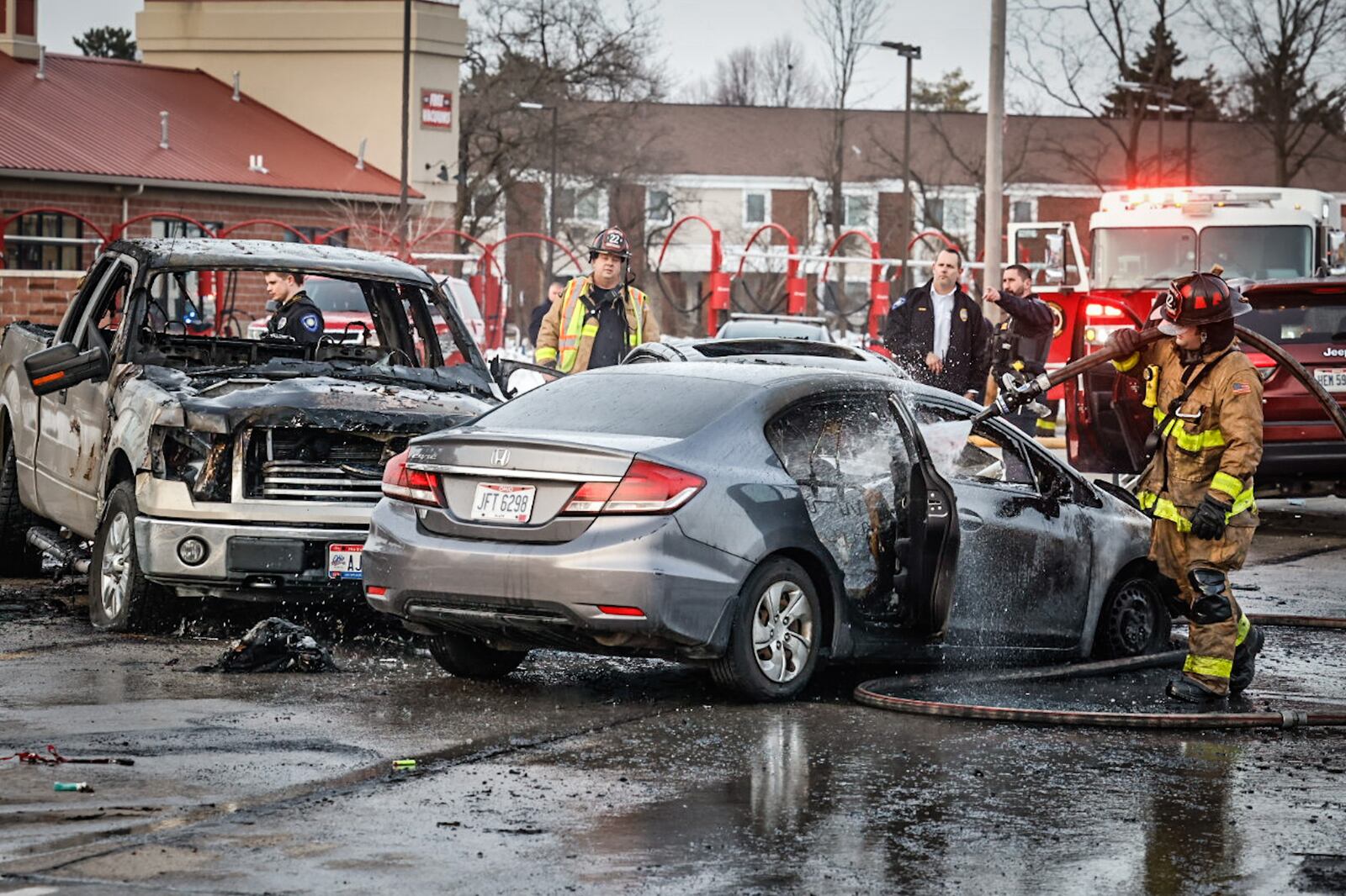 Police and medics responded to a fiery, multiple-vehicle crash with injuries Tuesday afternoon, Jan. 24, 2023, on Brandt Pike north of Chambersburg Road in Huber Heights. JIM NOELKER/STAFF