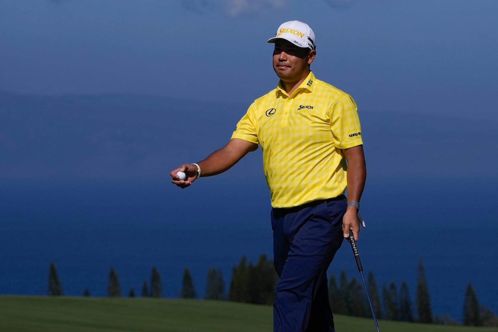 Hideki Matsuyama, of Japan, reacts after missing birdie on the fourth green during the final round of The Sentry golf event, Sunday, Jan. 5, 2025, at Kapalua Plantation Course in Kapalua, Hawaii. (AP Photo/Matt York)