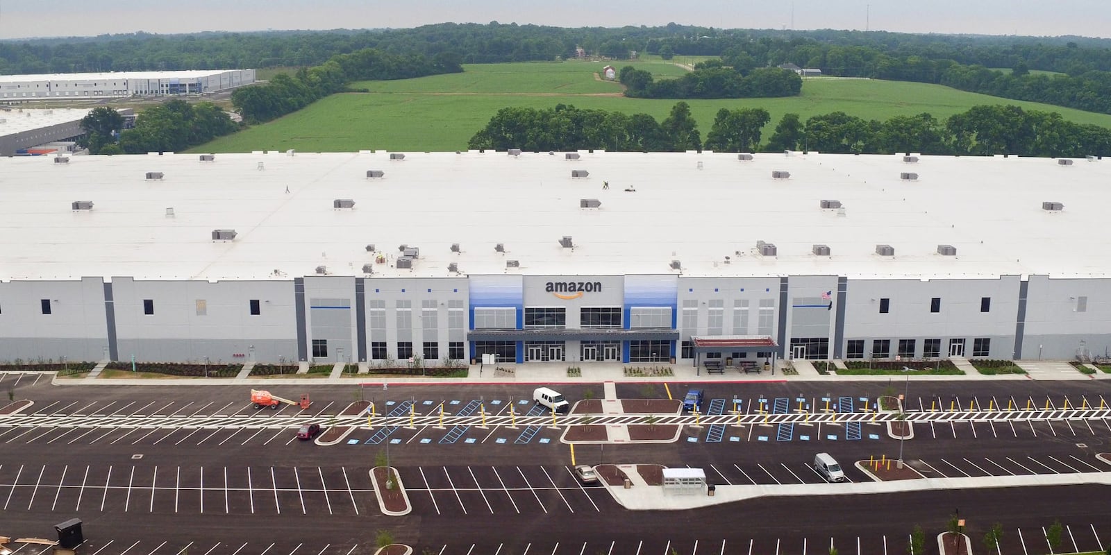 Giant warehouses cover Park North in Monroe where Amazon recently built a million-square-foot distribution center. TY GREENLEES / STAFF