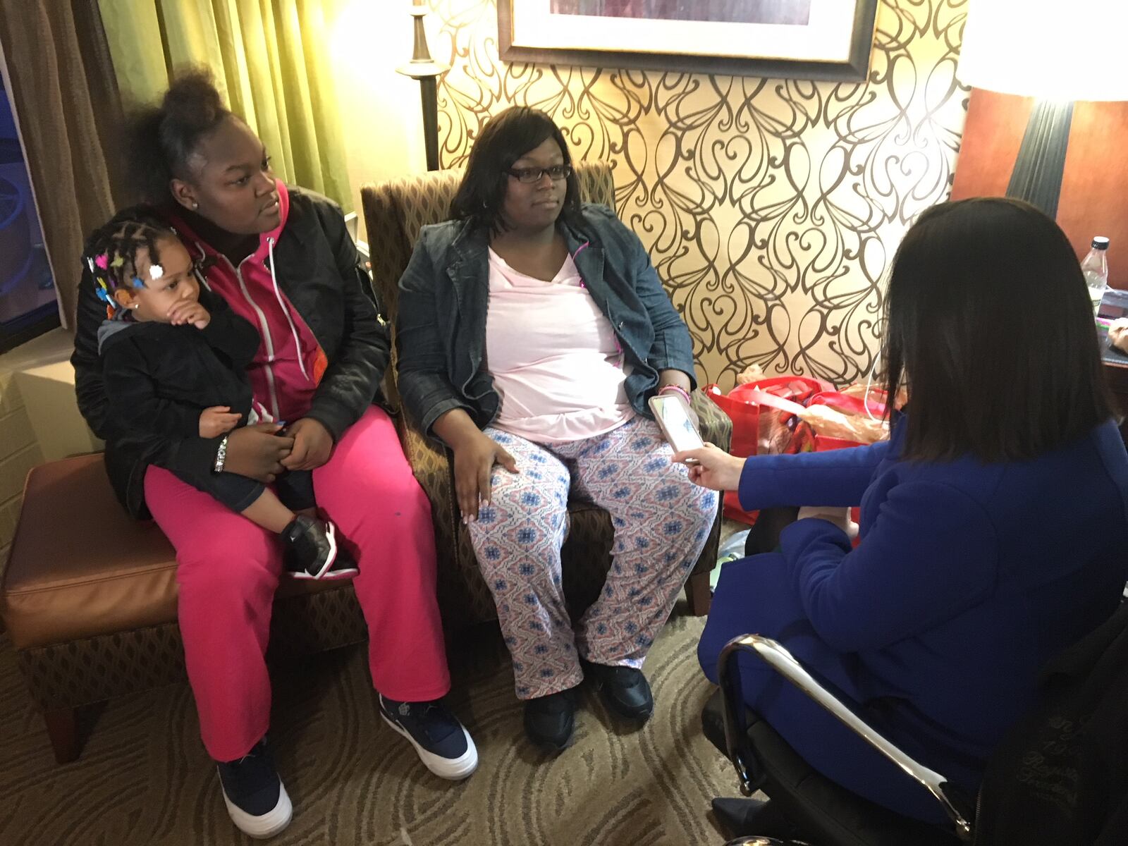 De'Errica Hines, her mother and the little sister she rescued talk about what the teenager did to rescue the young one and two cousins from a fire in the apartment complex where they lived. (Michael Burianek/Staff)