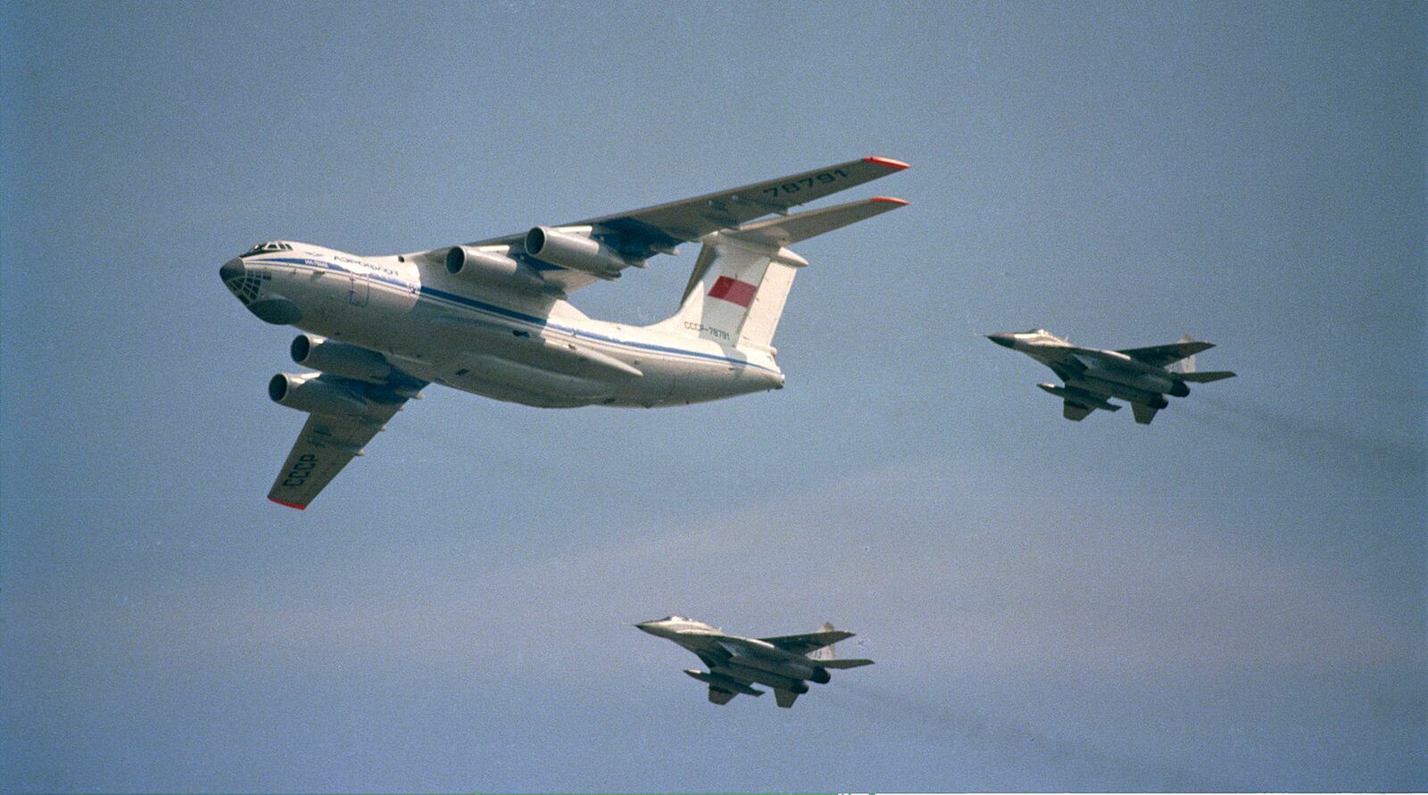 Flanked by two MiG-29 Fulcrums, the Il-76 lead the Russians to Dayton, along with an armed F-16 escort, not pictured.