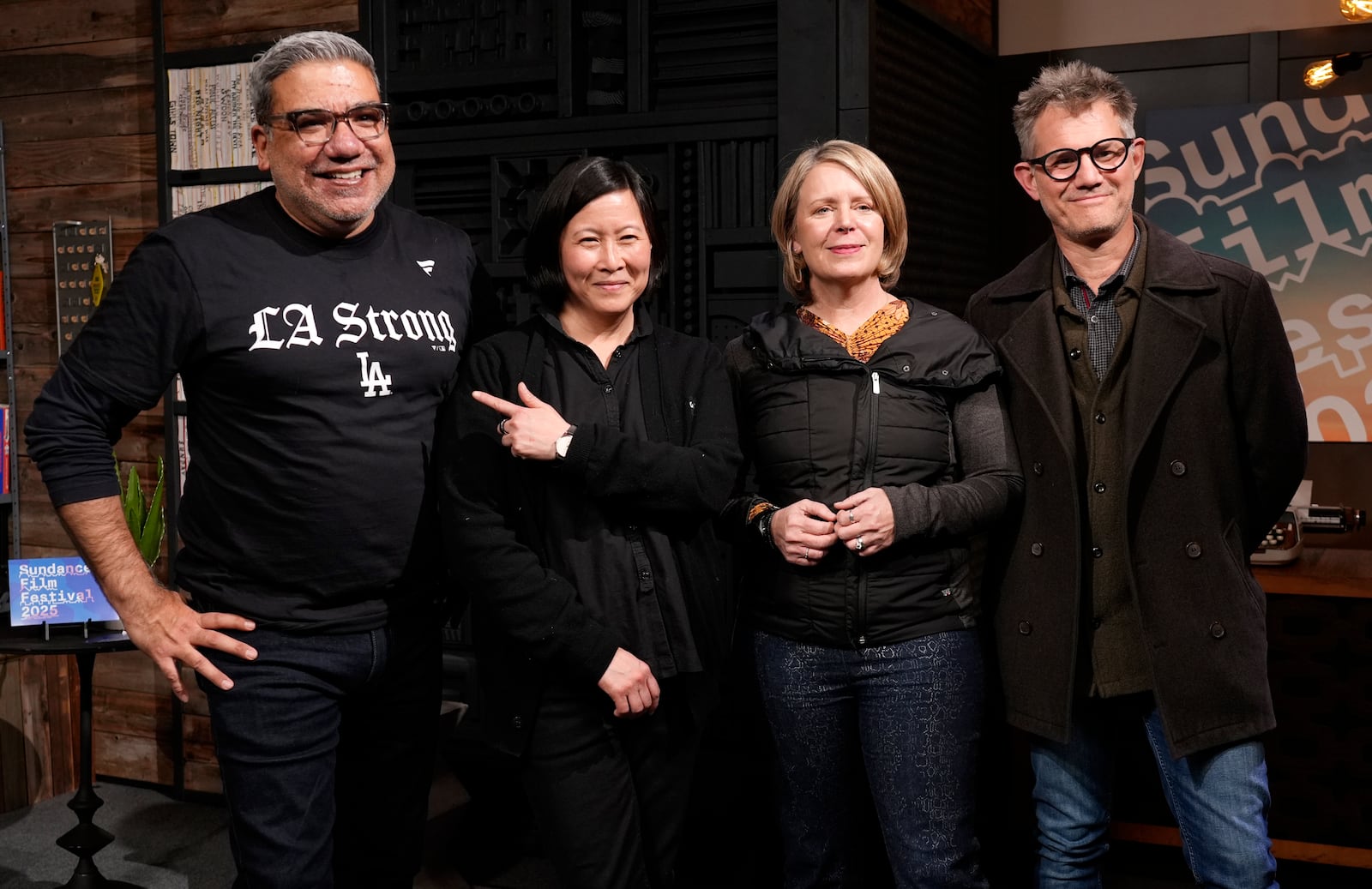 From left, Sundance Film Festival director Eugene Hernandez, director of programming Kim Yutani, Sundance Institute Acting CEO Amanda Kelso and senior festival programmer John Nein pose together at a news conference before the 2025 Sundance Film Festival on Wednesday, Jan. 22, 2025, in Park City, Utah. (AP Photo/Chris Pizzello)