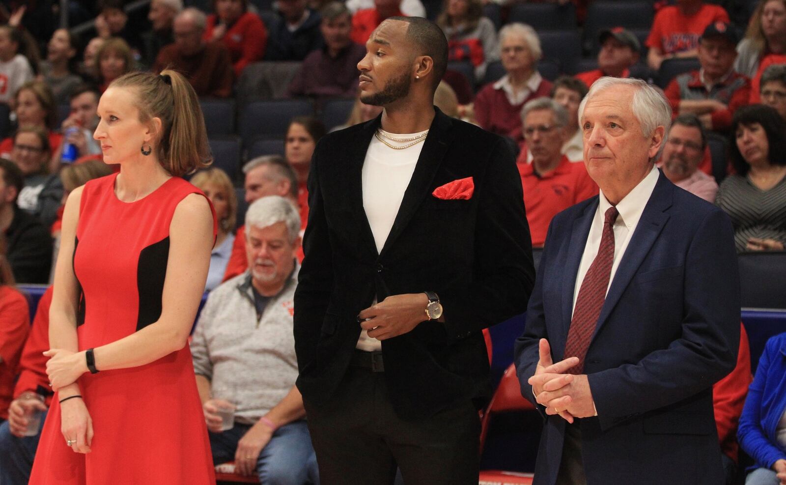 From left, Kristin Daugherty Ronai, Chris Wright and Tim Wabler were announced Saturday as the newest members of the Dayton Flyers Hall of Fame. David Jablonski/STAFF