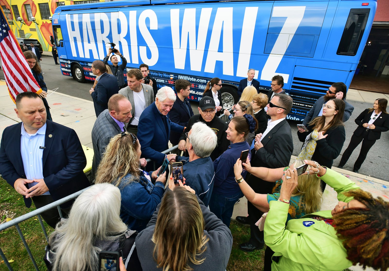 Former President Bill Clinton greets supporters while campaigning for Democratic Party presidential nominee Vice President Kamala Harris during a stop at Bottle Works in the Cambria City section of Johnstown, Pa., Tuesday, Oct. 29, 2024. (Thomas Slusser/The Tribune-Democrat via AP)