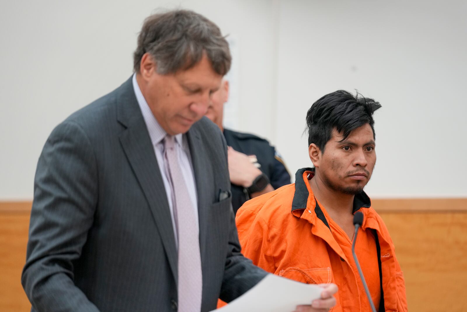 Sebastian Zapeta, right, accused of burning a woman to death inside a New York City subway train, appears in Kings County Supreme Court for an arraignment, Tuesday, Jan. 7, 2025, in New York. (AP Photo/Seth Wenig)