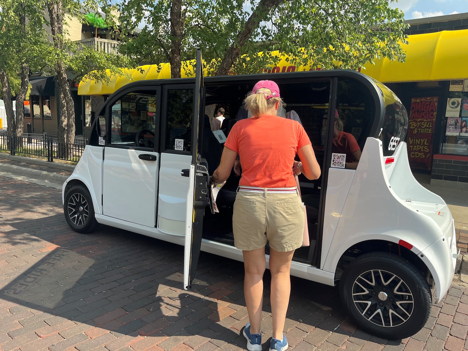 GEST Dayton, a new electric cart ride service, offered free rides in downtown Dayton during Art in the City on Saturday, Aug. 3, 2024. CORNELIUS FROLIK / STAFF