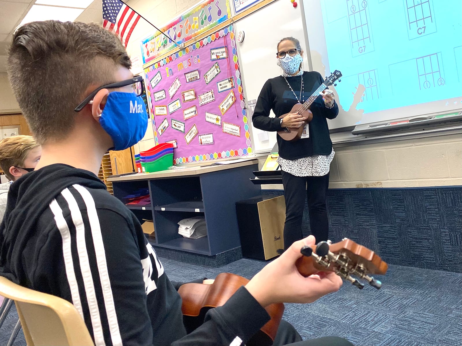 Larissa McIntosh, sixth grade choir and strings teacher at Springboro Intermediate School, organized a fundraiser to purchase ukuleles for her choir students to learn and play. CONTRIBUTED PHOTO / SCOTT MARSHALL